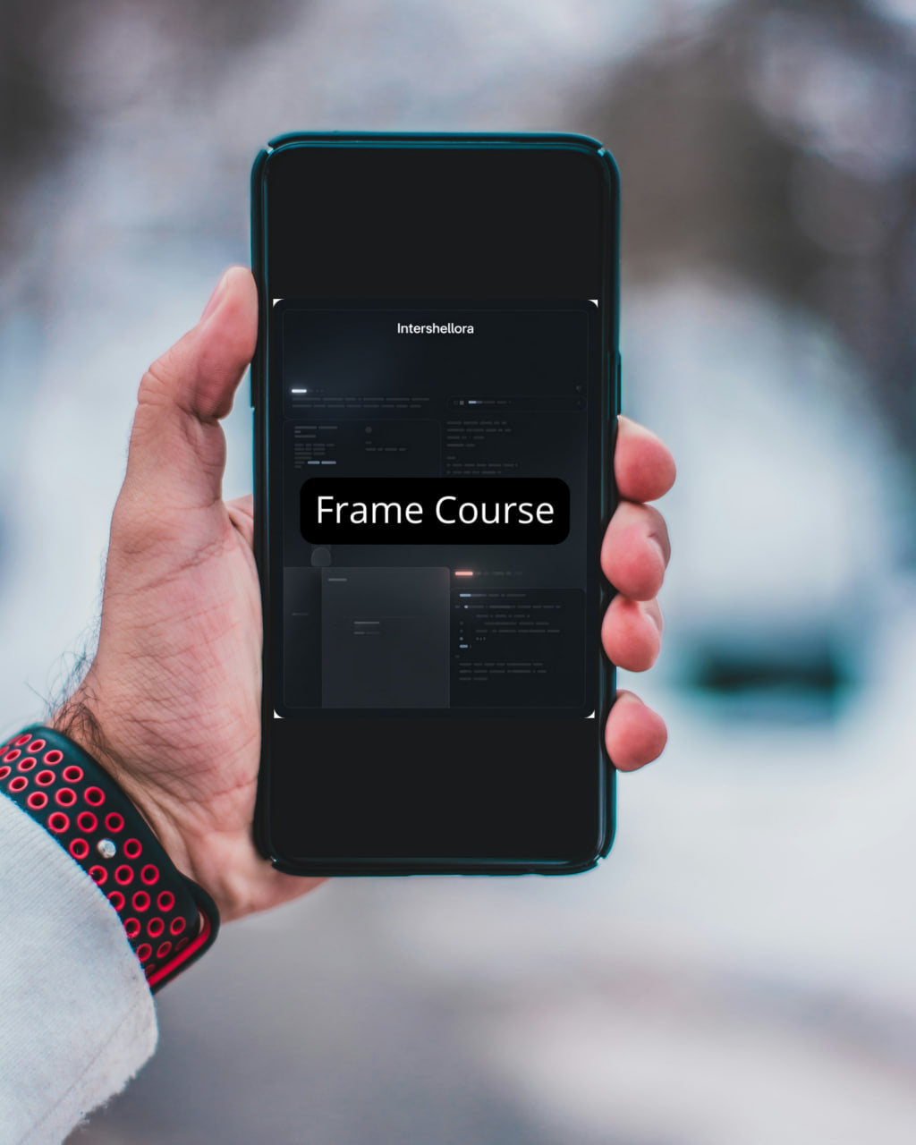 Hand holding a smartphone displaying 'Cipher Framework' with a blurred outdoor background